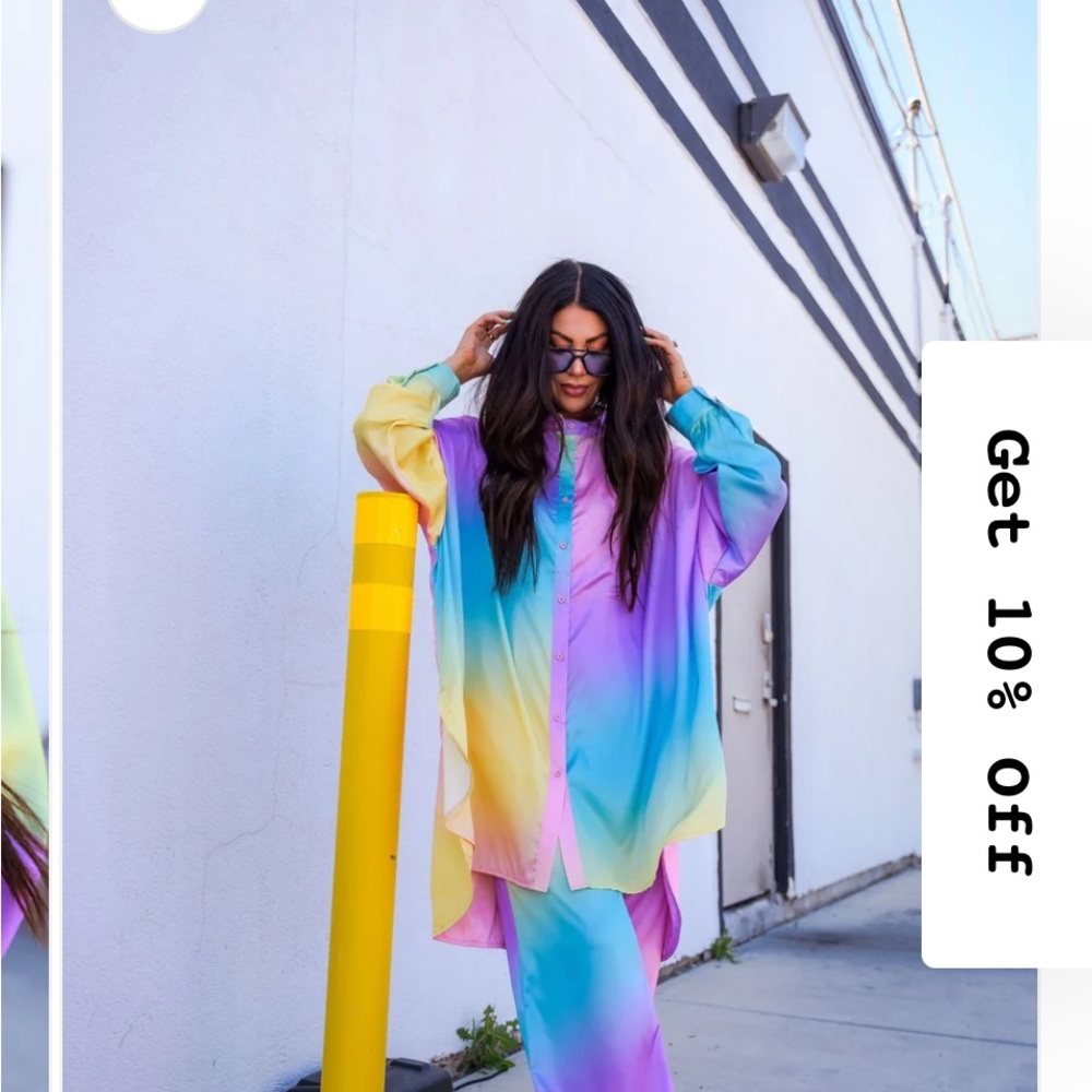 Dressed in LALA satin playsuit in Rainbow Daydream